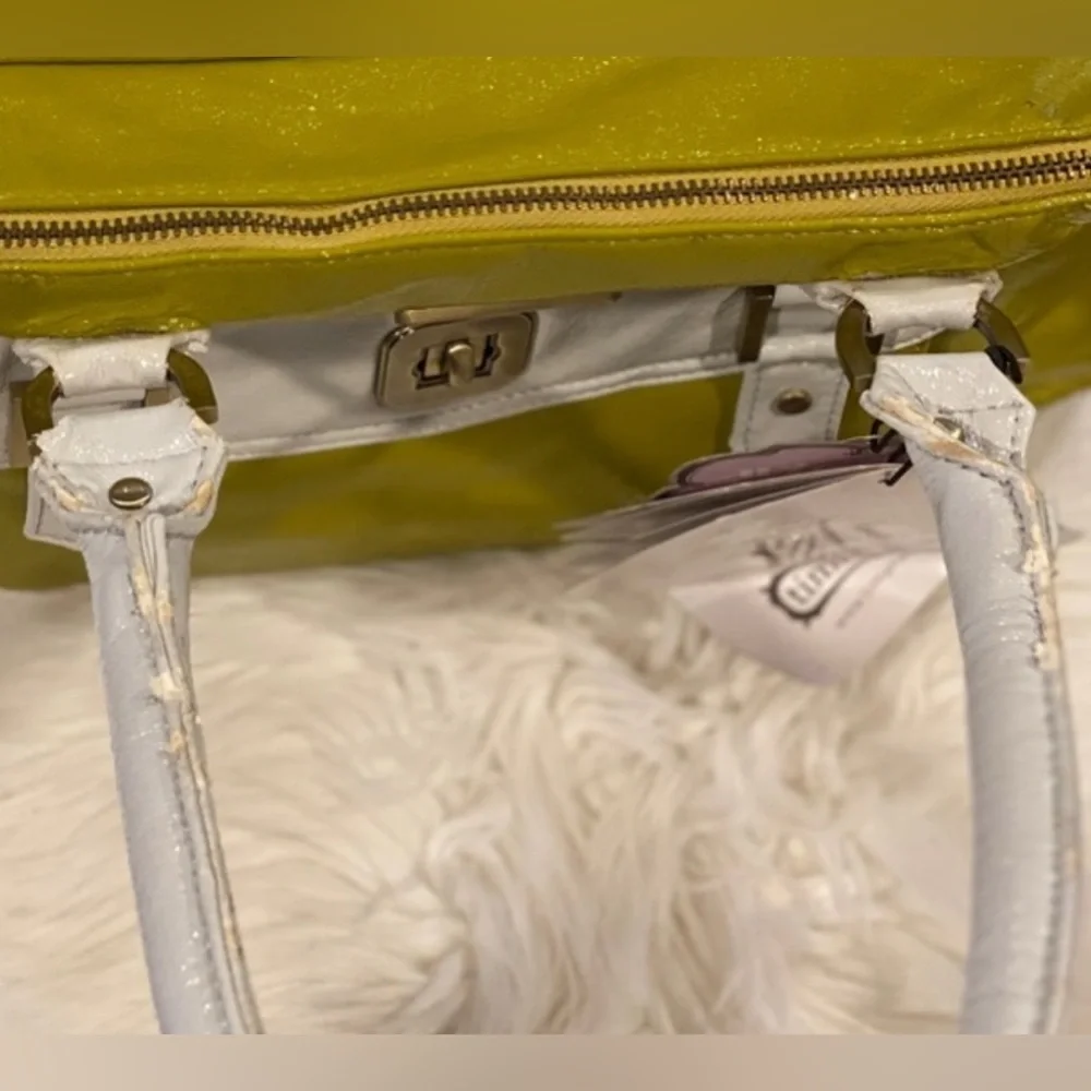Timi and‎ Leslie Green and White Diaper Bag with Accessories.